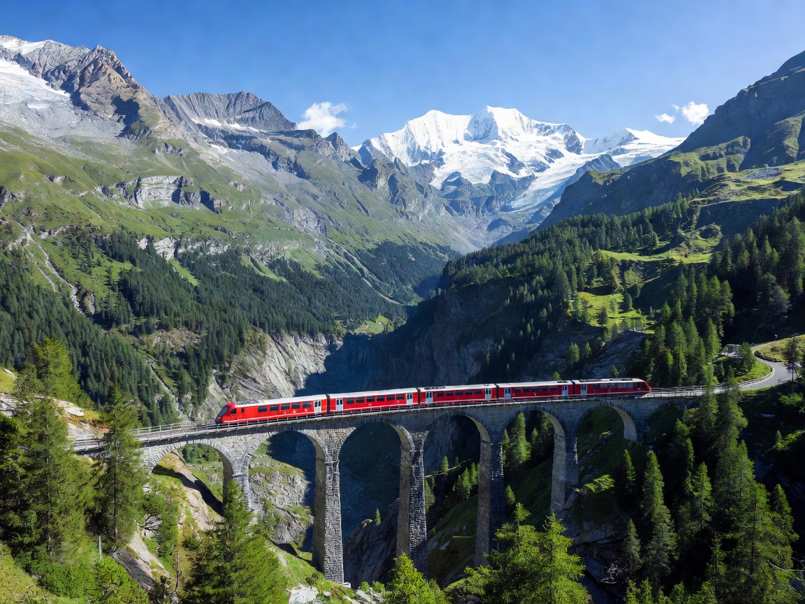 Swiss Glacier Express train crossing Landwasser viaduct in Swiss Alps